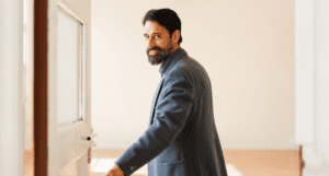 smiling man in suit