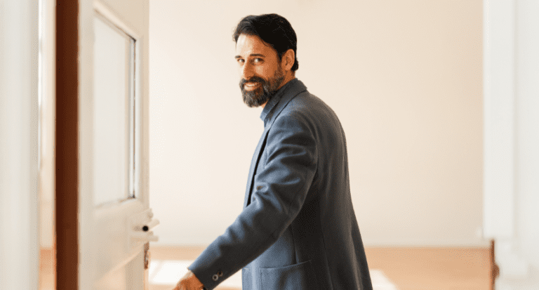 smiling man in suit
