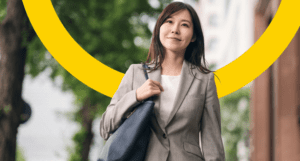 business woman walking and smiling