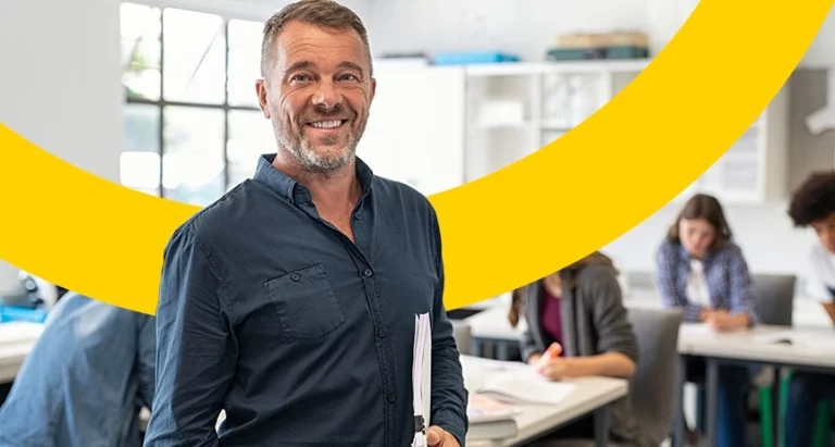 teacher smiling in classroom