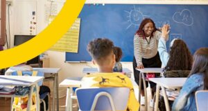 image of woman high fiving a student in class